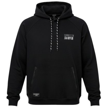 Connected Carper black hoodie with geometric carp print on back, worn by a fisherman by the water.