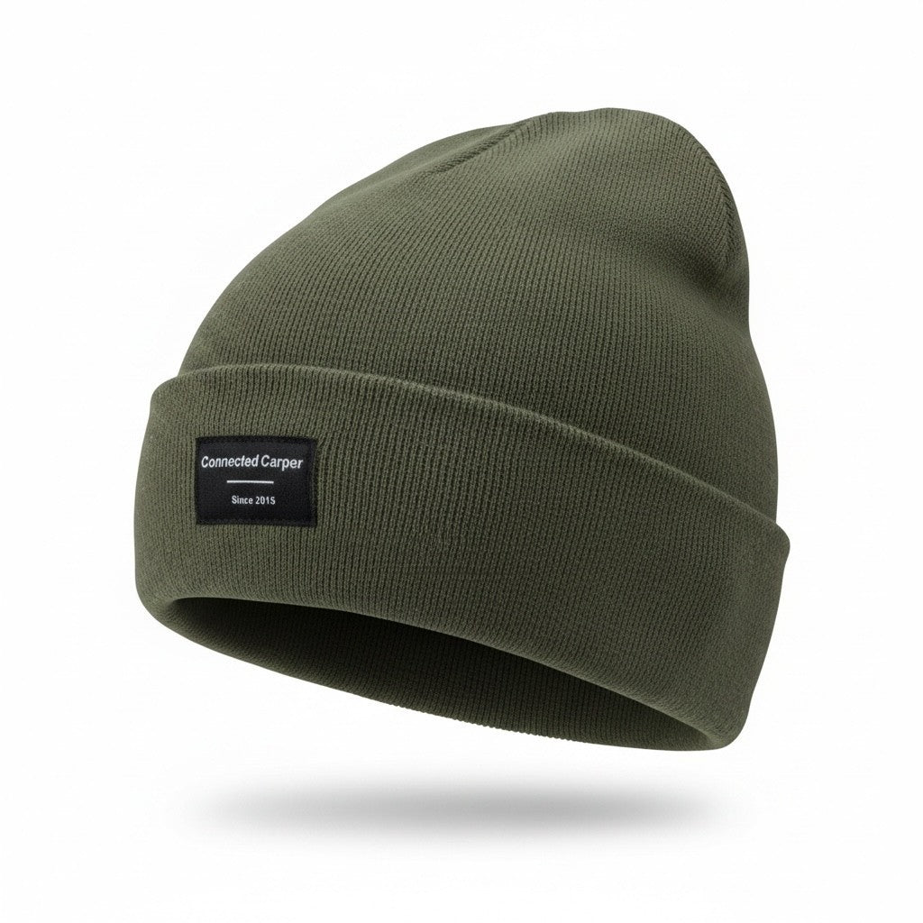 Connected Carper olive green minimalist acrylic beanie with a small black brand patch on the folded cuff